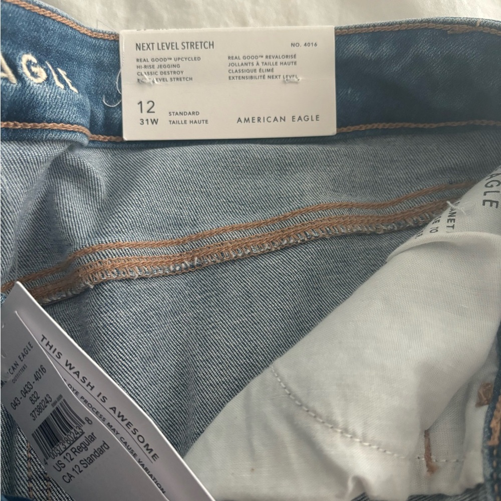 NEW AMERICAN EAGLE HIGH RISE JEANS size 12